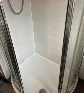 Refurbished shower tiles in a bathroom of a residential property in Northern Ireland